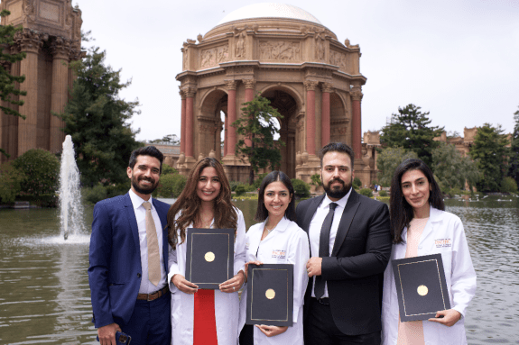 group standing in front of the Palace of Fine Arts
