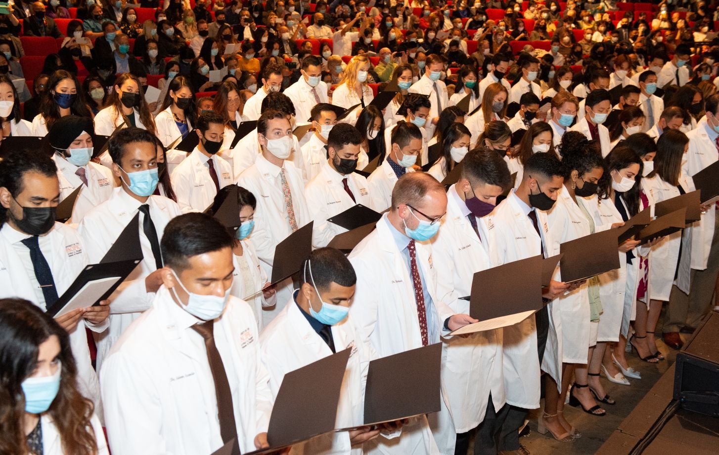 Students reciting their professional oath during the White Coat Ceremony