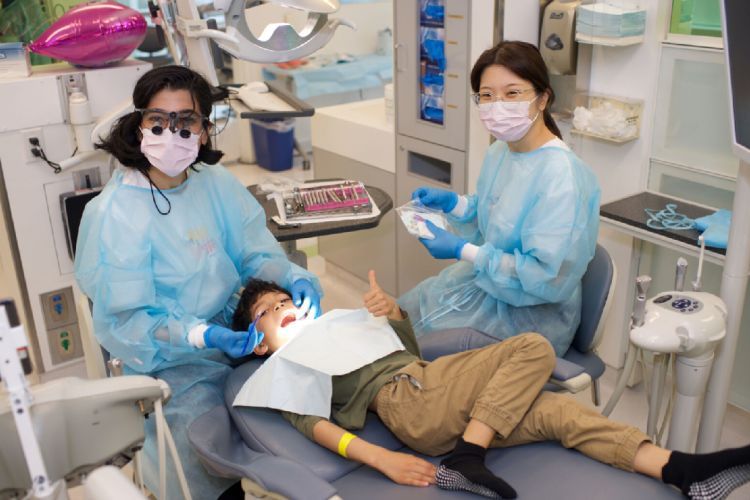 kid in dentist's chair