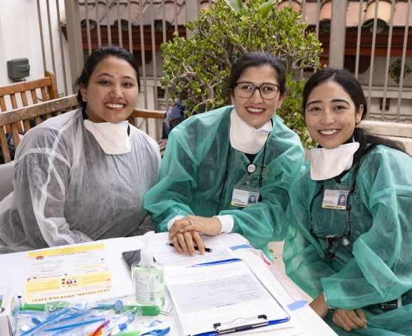 SCOPE volunteers at a table